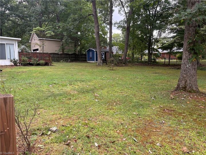 Property Photo:  5619 Virgilwood Drive  NC 27409 