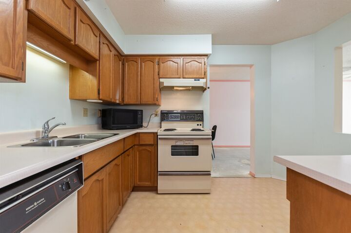 Property Photo:  8725 Elm Drive 202  BC V2P 4Y3 