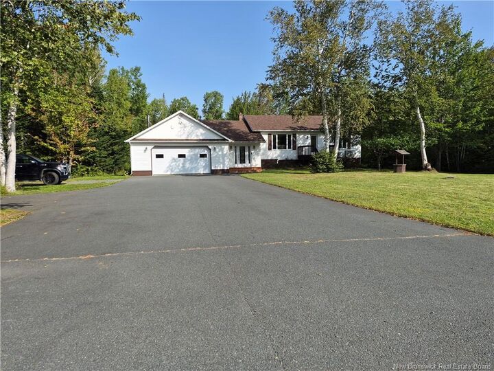 Property Photo:  120 Rue Frenette  NB E8K 3V7 