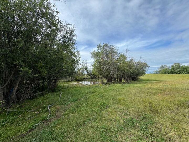 Property Photo:  SW-4-77-6-W6 ...  AB T0H 3G0 