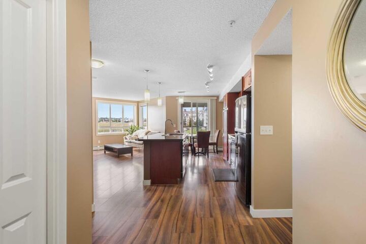 Property Photo:  108 Country Village Circle NE 207  AB T3K 0E3 