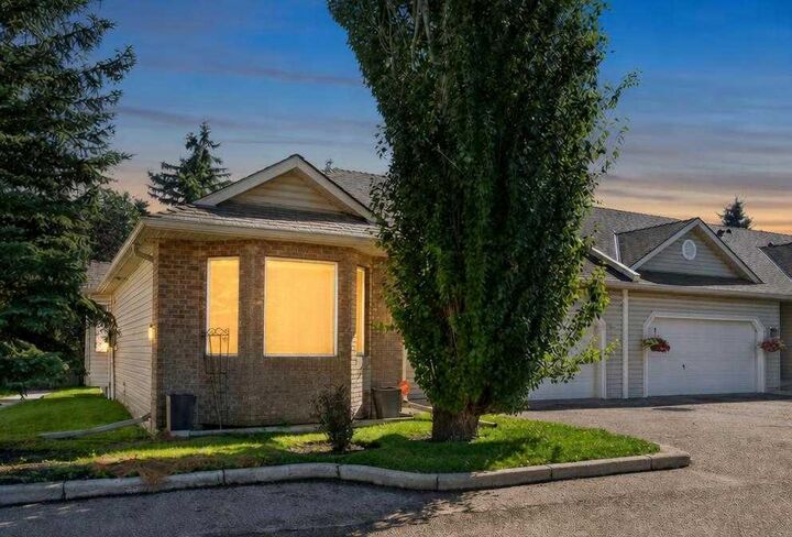 Property Photo:  113 Mt Douglas Villas SE  AB T2Z 3R5 