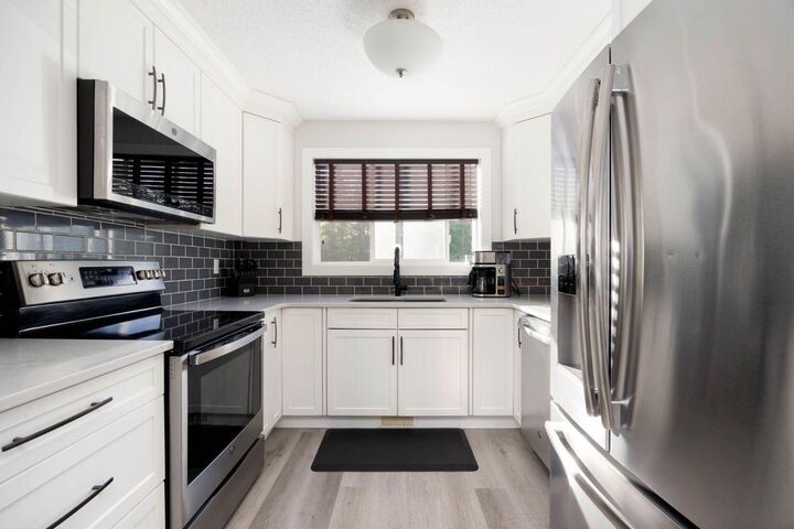 Property Photo:  1041 Timberline Drive  AB T9K 1A8 