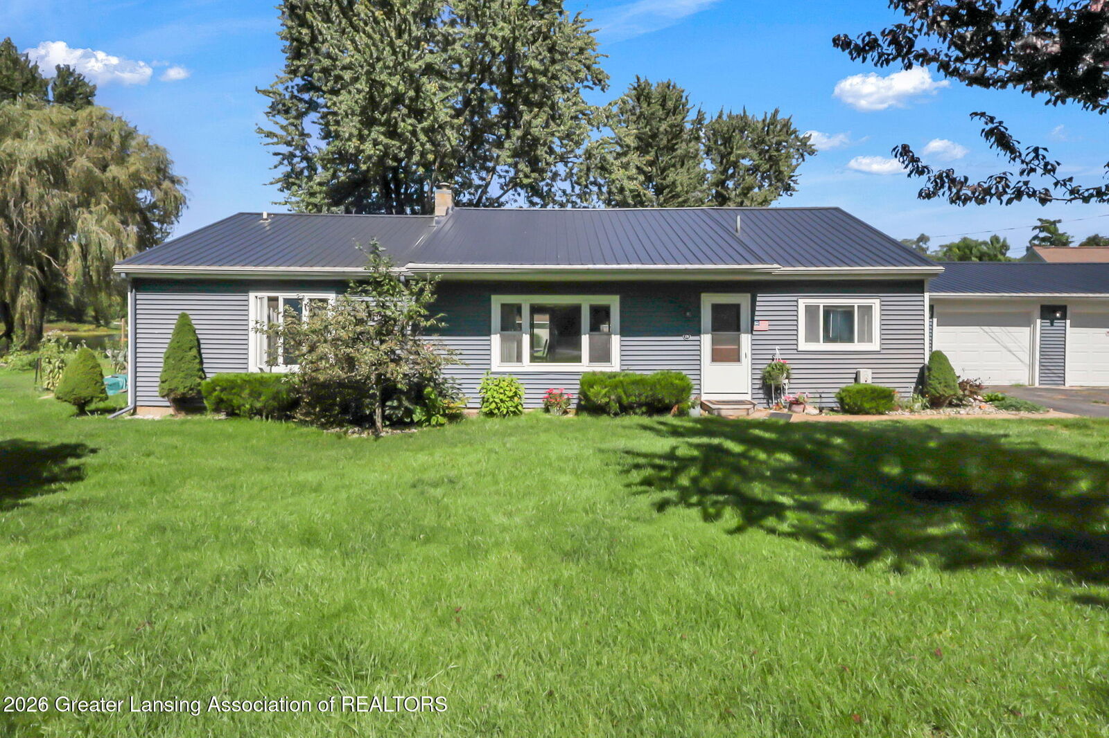 Property Photo: 116 E Coats Grove Road MI 49058