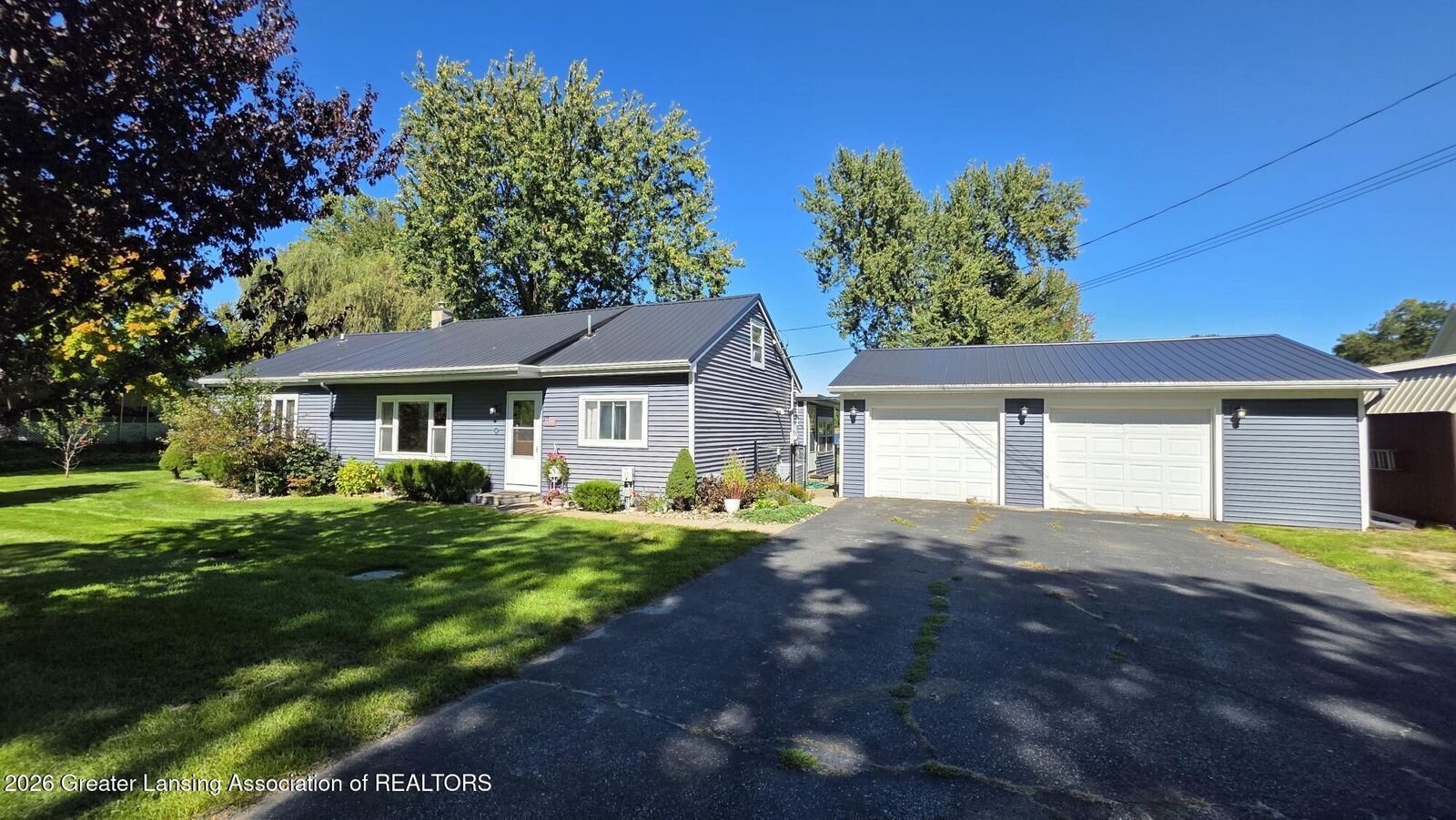 Property Photo: 116 E Coats Grove Road MI 49058