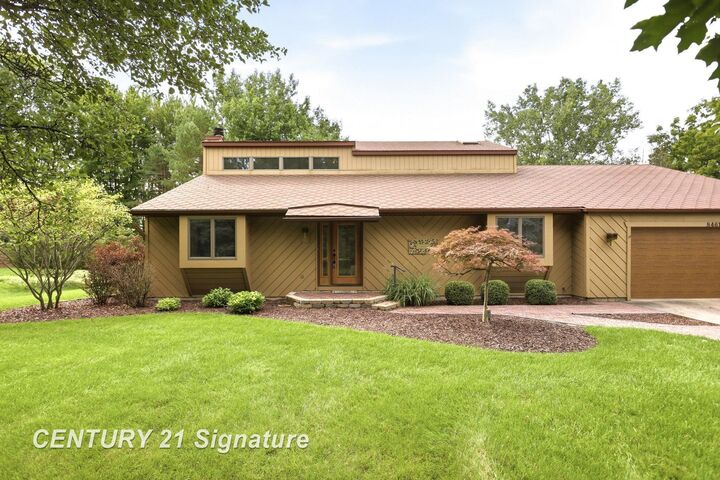 Property Photo:  8461 W Glencarin Drive  MI 48609 
