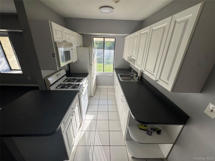 Property Photo:  4 Grande Ct 4  NY 11727 