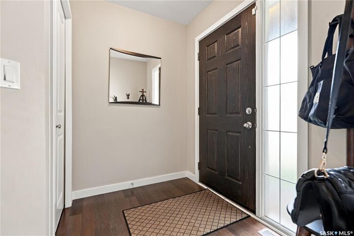 Property Photo:  410 Ledingham Way 203  SK S7V 0C4 