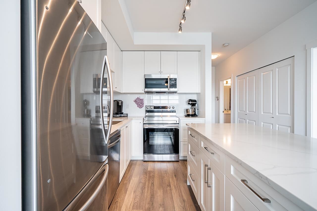 Property Photo:  13623 81A Avenue 414  BC V3W 3E2 