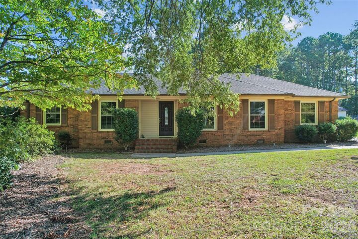 Property Photo:  13507 Four Oaks Lane  NC 28105 