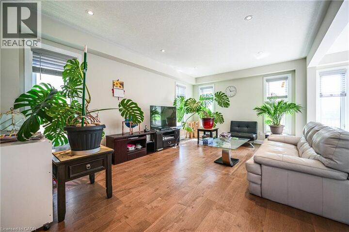 Property Photo:  318 Chokecherry Crescent  ON N2V 0H1 