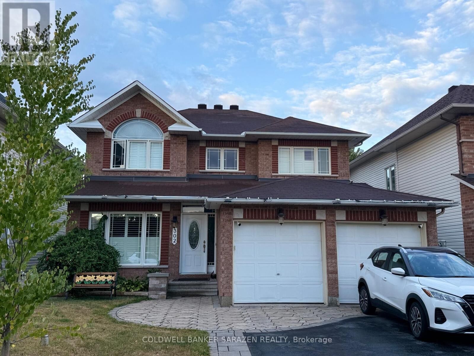 Property Photo:  302 Edgemoore Crescent East  ON K2W 1H9 