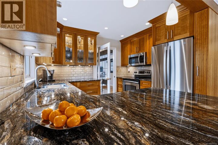 Property Photo:  1658 Brousson Drive  BC V8N 5S2 