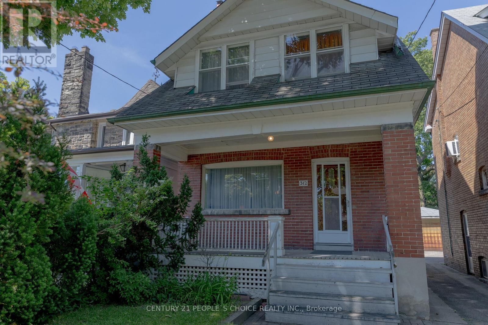 Property Photo: 312 Runnymede Road ON M6S 2Y6