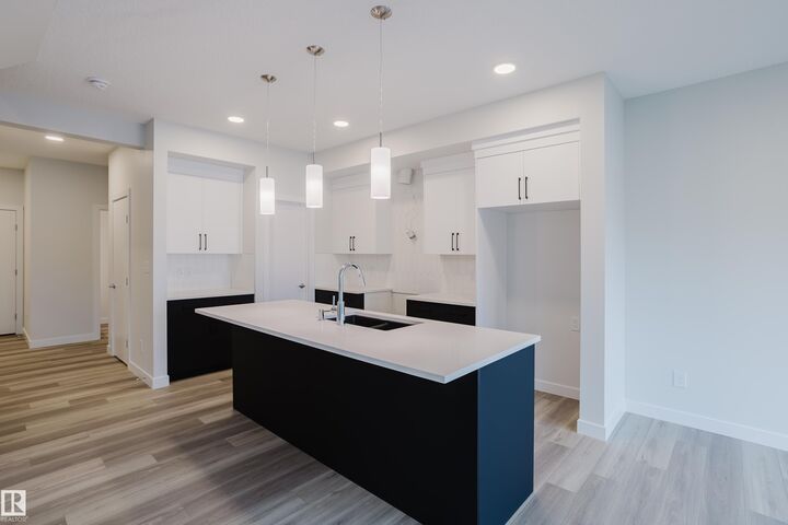 Property Photo: 18647 19 Avenue NW AB T6M 3M9