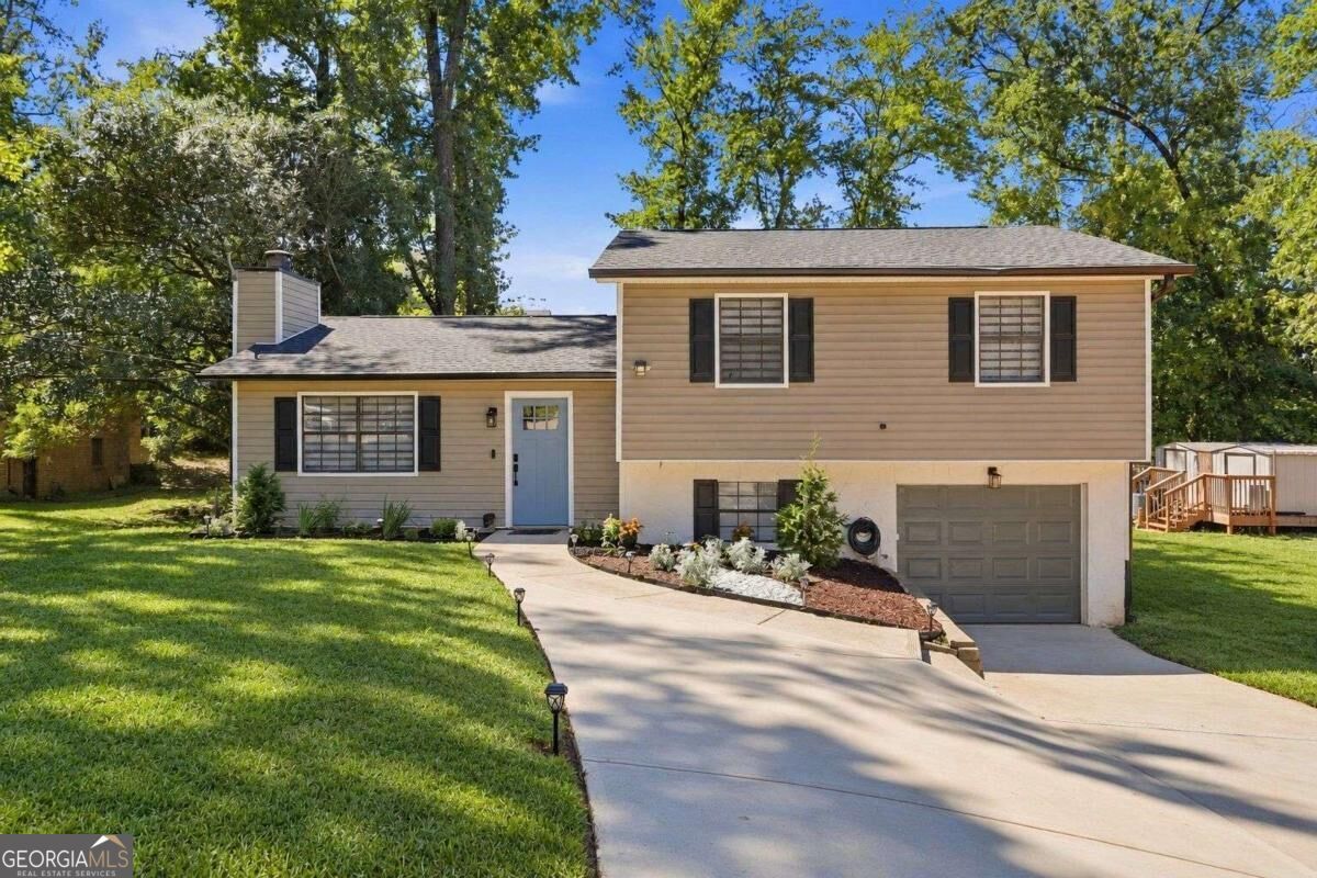 Property Photo:  3316 Alcazar Drive SW  GA 30047 