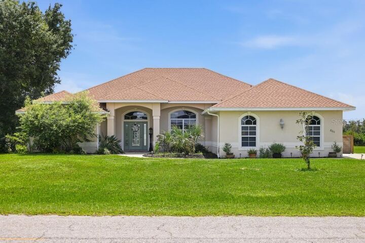 Property Photo: 8011 SW Sunny Oaks Drive FL 34269