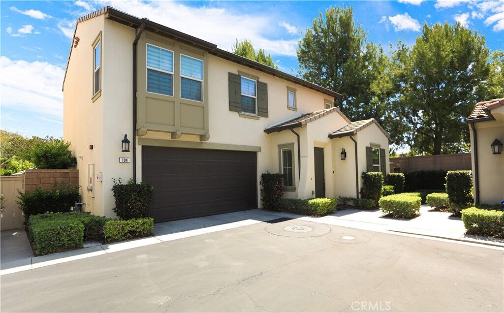 Property Photo: 104 Desert Bloom CA 92618