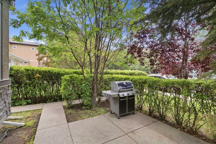 Property Photo:  523 34 Street NW 1  AB T2N 2X8 