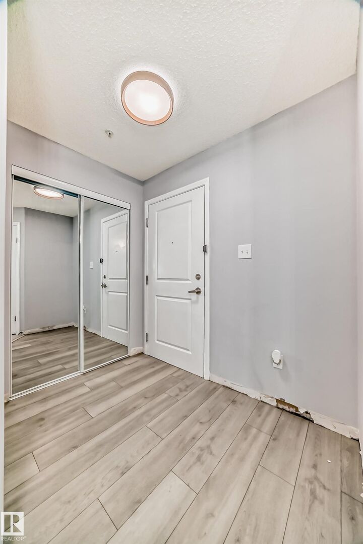 Property Photo:  11325 83 Street NW 112  AB T5B 4W7 