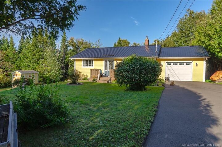 Property Photo:  811 Lorneville Road  NB E2M 7E5 