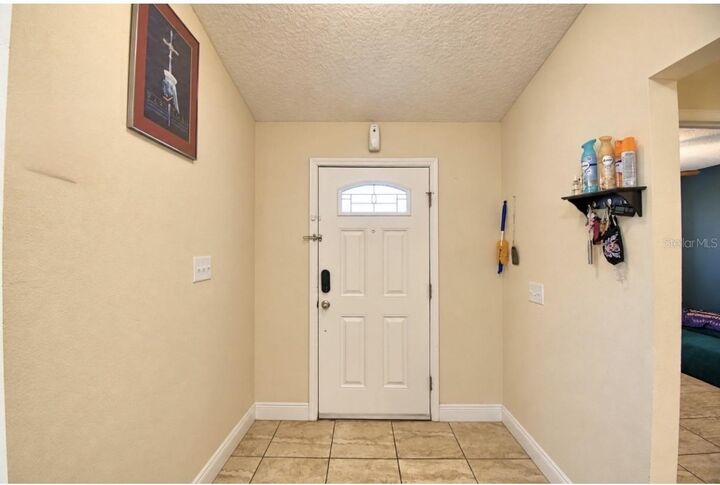 Property Photo: 2128 Orchid Way FL 34759