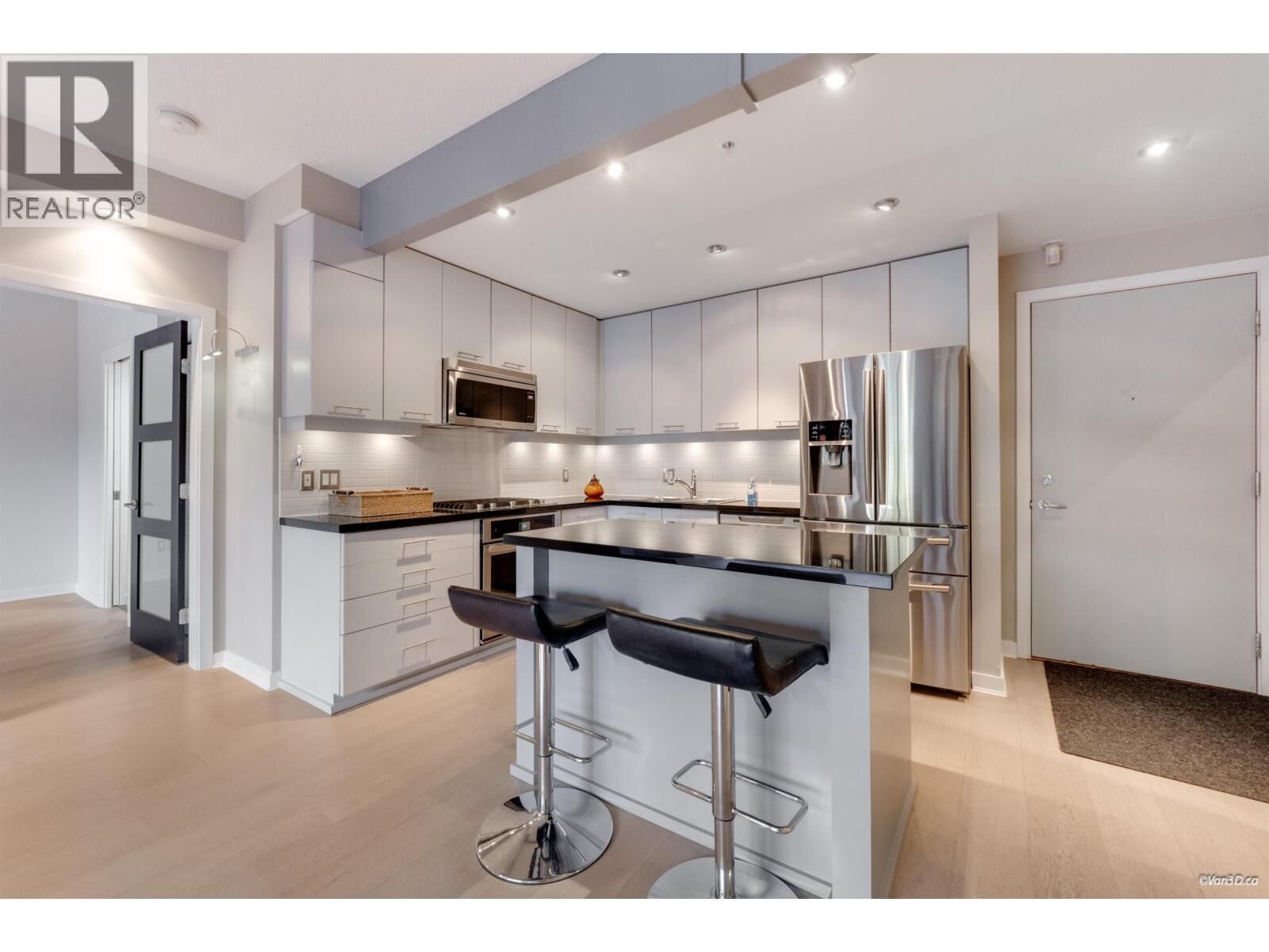Property Photo: 530 Raven Woods Drive 210 BC V7G 2T5