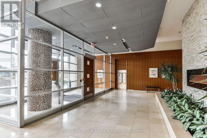 Property Photo: 220 Burnhamthorpe Road West 305 ON L5B 4N4