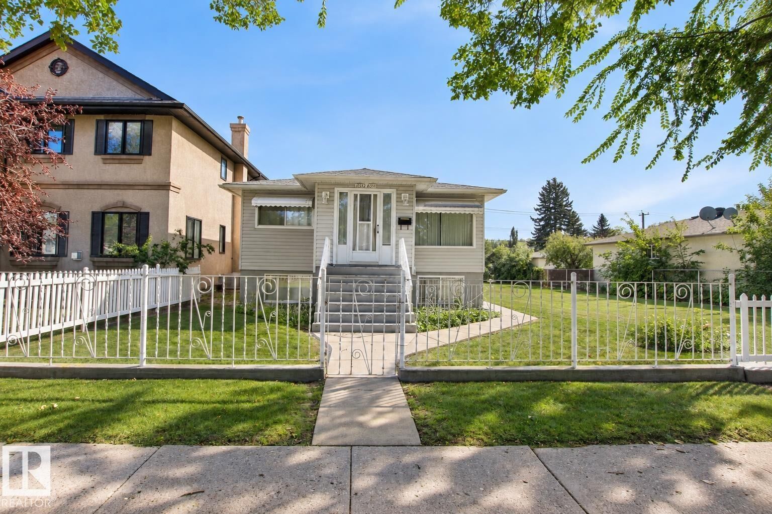 Property Photo: 10339 80 Street NW AB T6A 3J3