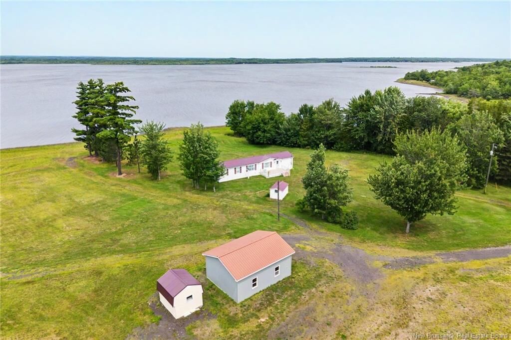 Property Photo:  388 Cox Point Road  NB E4A 2X7 