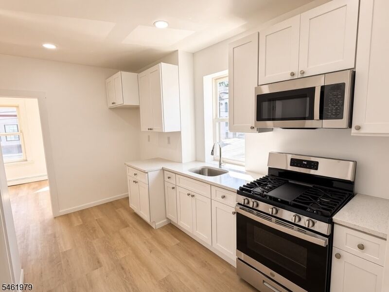 Property Photo:  85 Front St 1  NJ 07522 