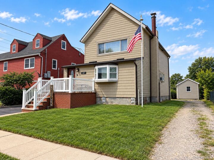 Property Photo:  61 5th Avenue  NY 11518 