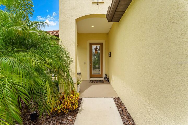 Property Photo: 208 Capriana Court FL 34275
