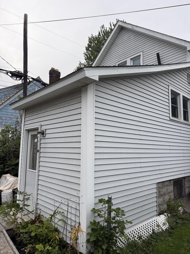 Property Photo:  210 S 7th Avenue  MI 49707 