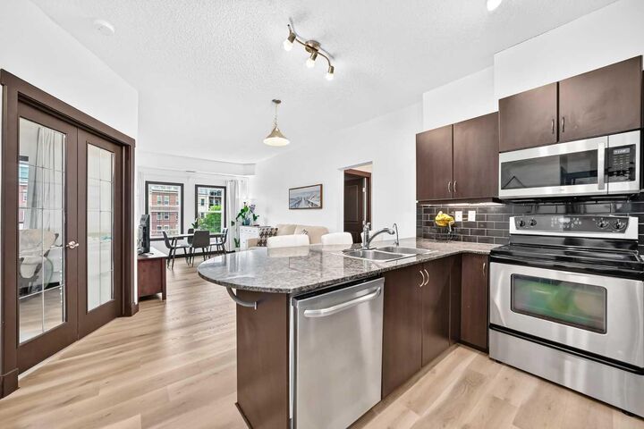 Property Photo:  11811 Lake Fraser Drive SE 4203  AB T2J 1J7 