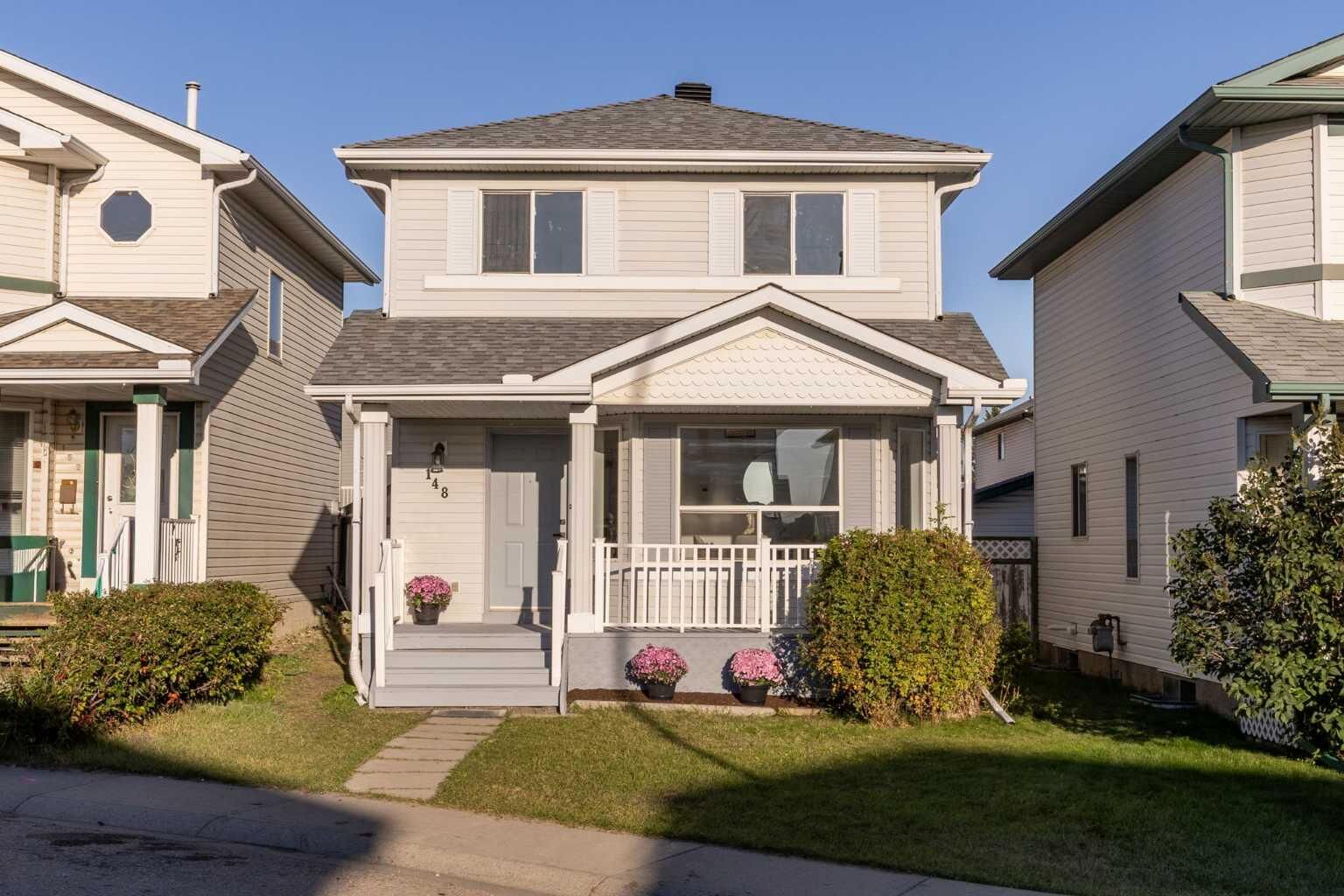 Property Photo: 148 Arbour Wood Mews NW AB T3G 4B5