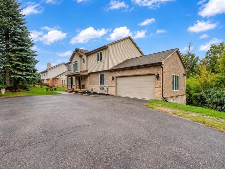 Property Photo:  7295 W Maple Road  MI 48322 