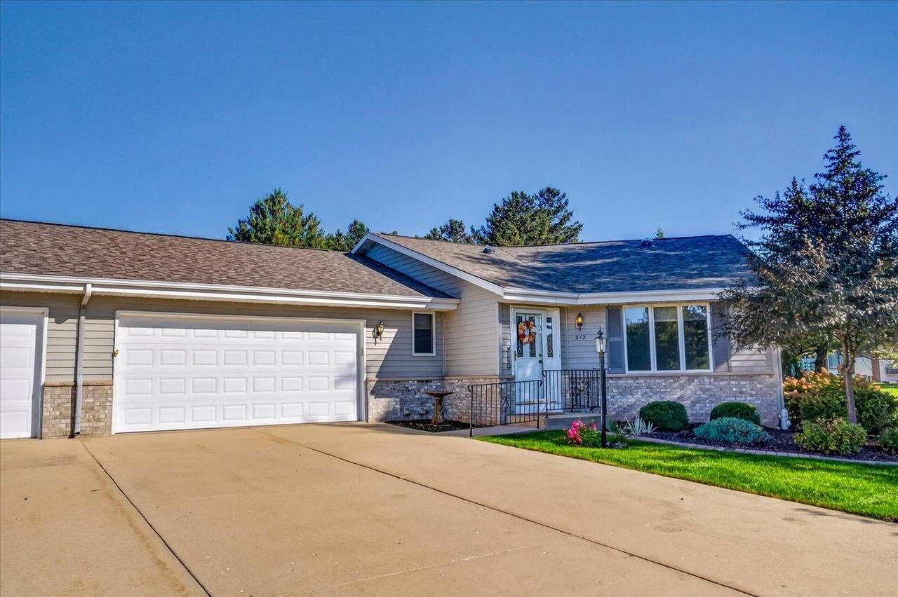 Property Photo: 212 W Meadows Drive 14 WI 53534