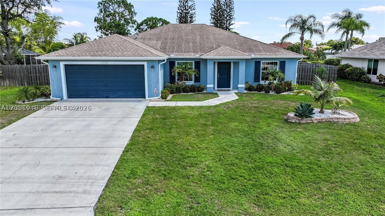 Property Photo:  1557 SW Aledo Ln  FL 34953 