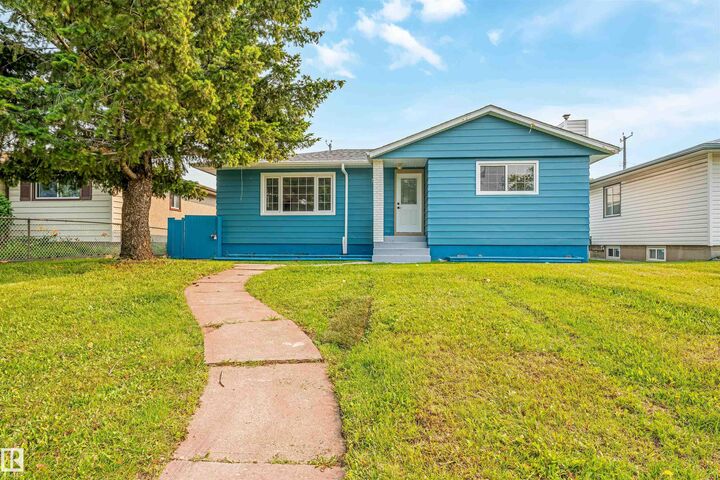 Property Photo:  12023 137 Avenue NW  AB T5E 1Z7 