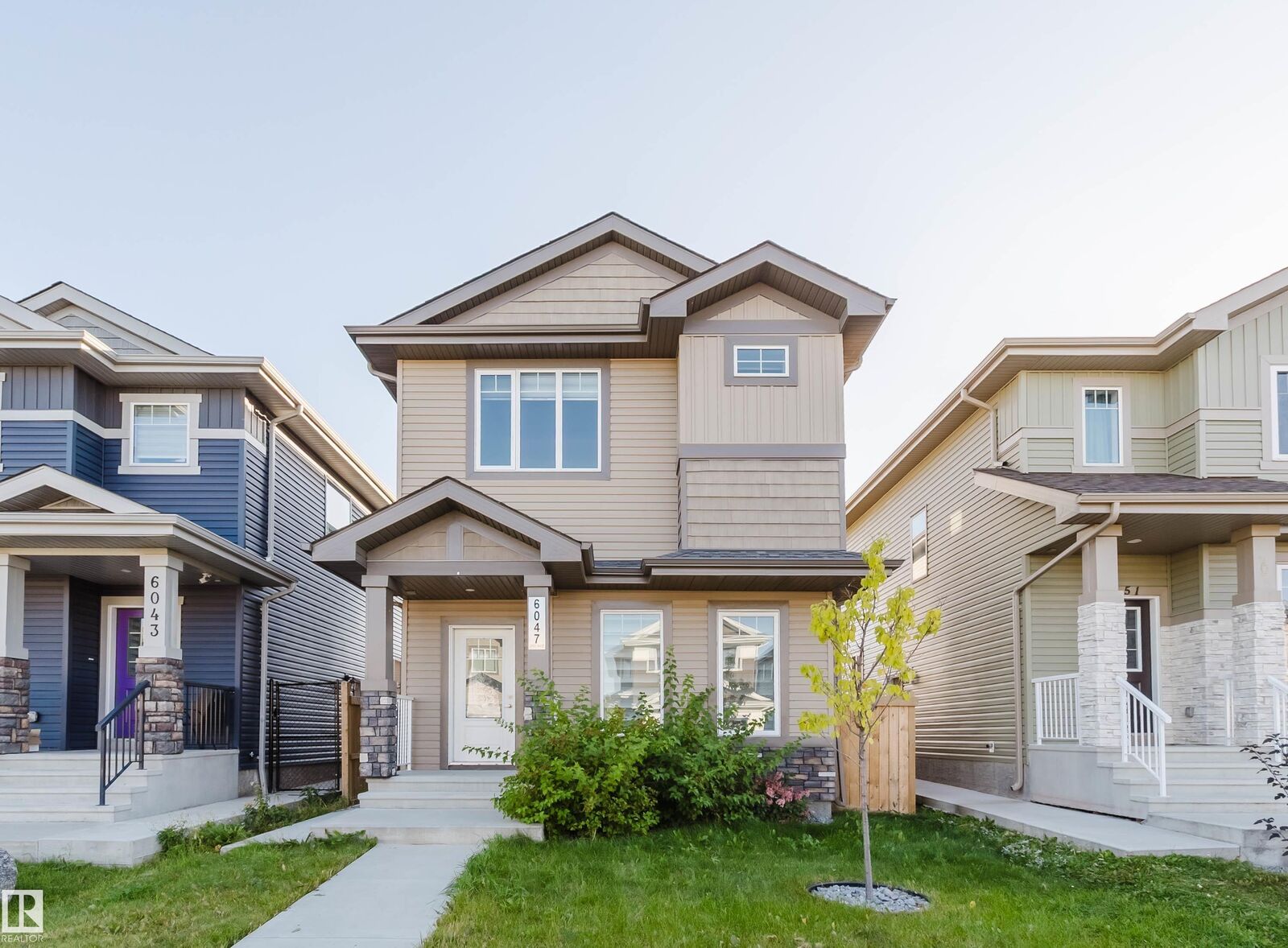 Property Photo:  6047 180 Avenue NW  AB T5Y 3W9 