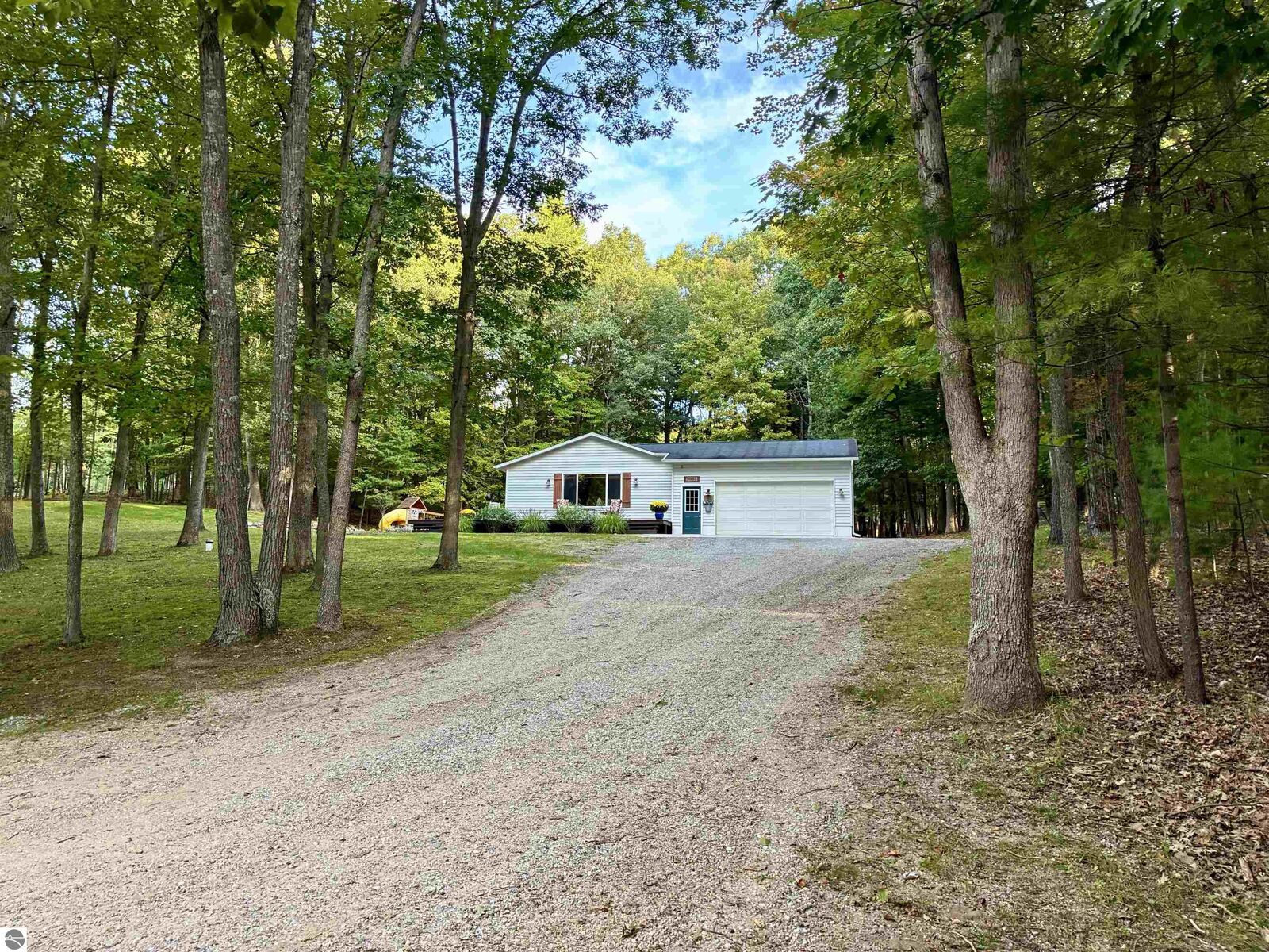 Property Photo:  3061 N Arbutus Lake Road  MI 49684 