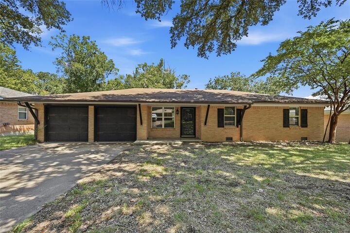 Property Photo: 1303 Lafayette Drive TX 75020