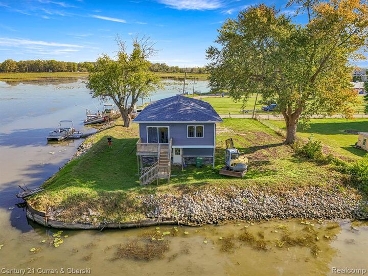 Property Photo:  6809 Lakeshore Drive  MI 48166 