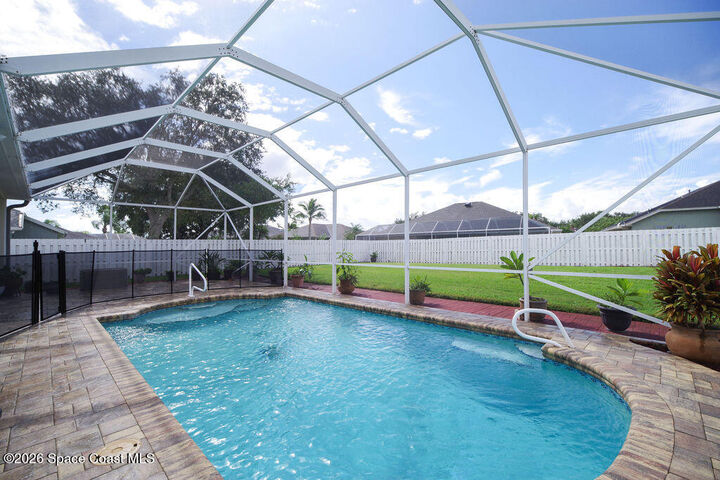 Property Photo: 863 Coopers Hawk Court FL 32955