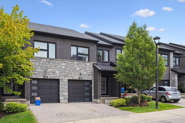 Property Photo:  91 Poppy Drive E 48  ON N1L 0M6 