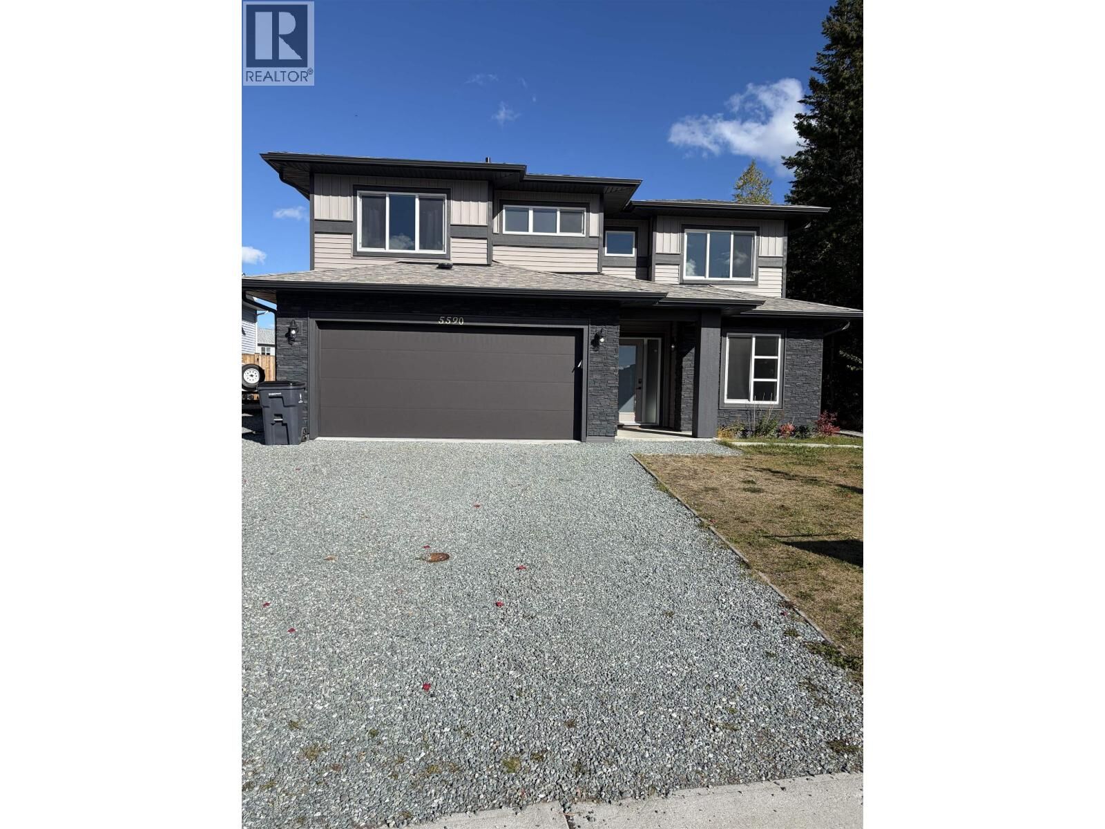 Property Photo:  5590 Woodvaley Drive  BC V2K 5A6 