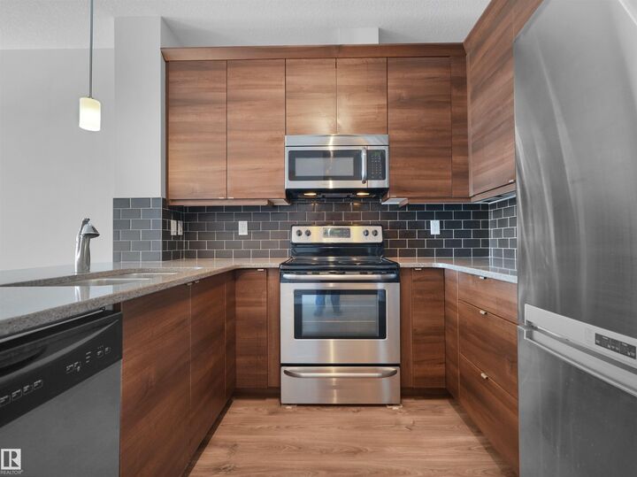 Property Photo: 2588 Anderson Way SW 415 AB T6W 0R2