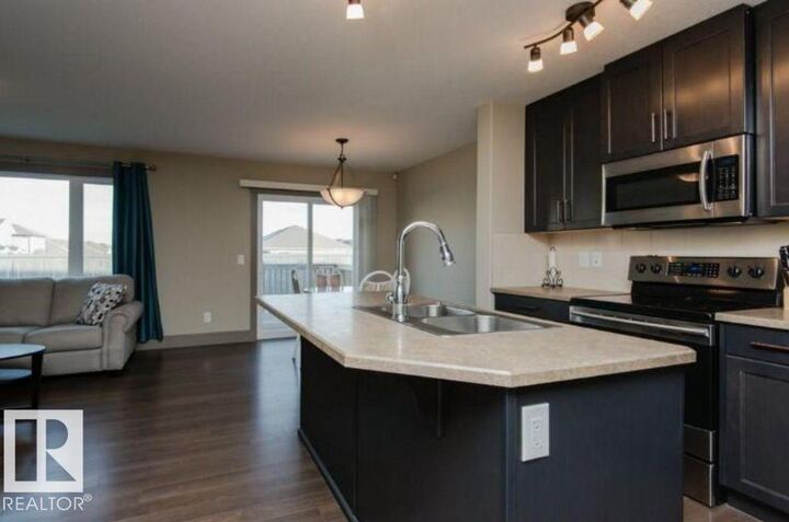 Property Photo:  7233 Armour Crescent SW  AB T6W 2S1 