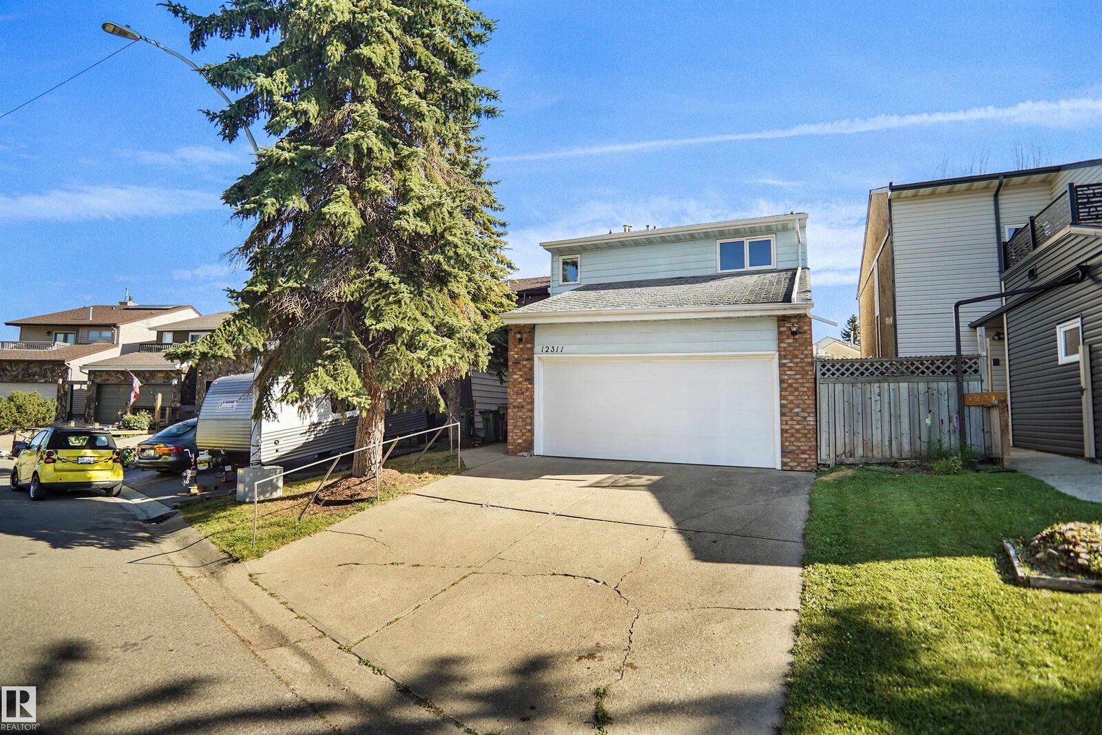 Property Photo:  12311 25 Avenue NW  AB T6J 4S7 